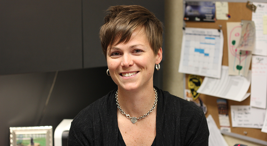 Smiling female professional in office setting