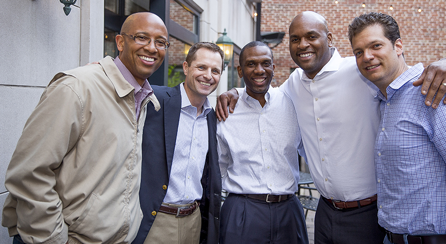 Group photo of five professional men