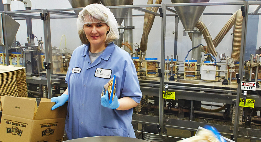 Keefe Group employee in packaging center