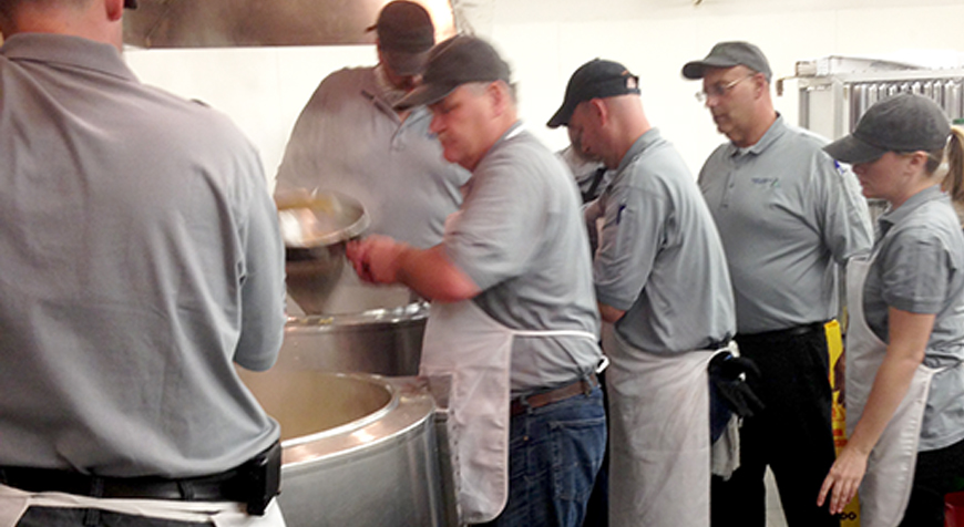 Group of men working in foodservice environment